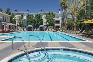 a swimming pool at a hotel with a resort at Sunnyvale 1BR w Pool WD Gym nr 101 SFO-1049 in Sunnyvale