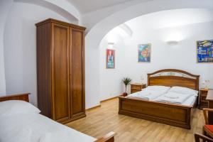 Postel nebo postele na pokoji v ubytování Hostel Little Quarter