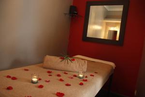 Postel nebo postele na pokoji v ubytování Riad Utopia Suites And Spa