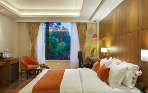 Letto o letti in una camera di Hotel Thrive, A Tropical Courtyard