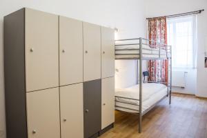 Postel nebo postele na pokoji v ubytování Hostel Little Quarter