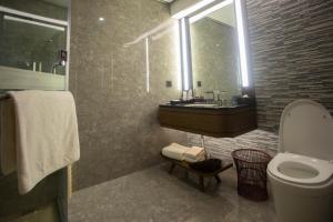 Baðherbergi á Huanyu Jun Hui Hotel