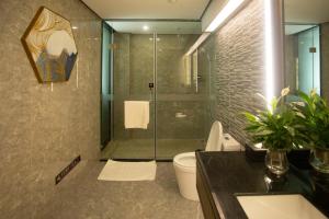 Baðherbergi á Huanyu Jun Hui Hotel