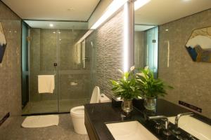 Baðherbergi á Huanyu Jun Hui Hotel