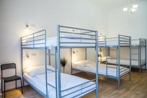 Postel nebo postele na pokoji v ubytování Hostel Little Quarter