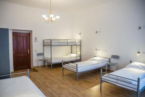 Postel nebo postele na pokoji v ubytování Hostel Little Quarter