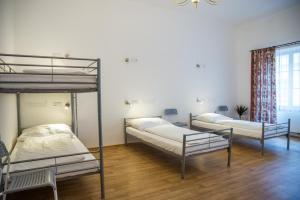 Postel nebo postele na pokoji v ubytování Hostel Little Quarter