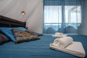 Postel nebo postele na pokoji v ubytování Villa Las Puertas + 37 fotografií