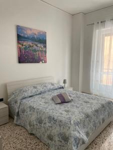 Posteľ alebo postele v izbe v ubytovaní I Giardini di Manu’
