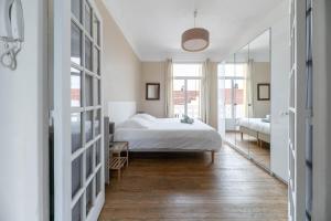 Posteľ alebo postele v izbe v ubytovaní Le larbaud - Appartement calme et lumineux en centre ville