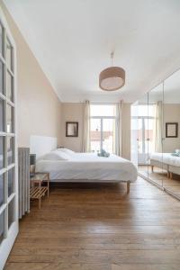 Posteľ alebo postele v izbe v ubytovaní Le larbaud - Appartement calme et lumineux en centre ville