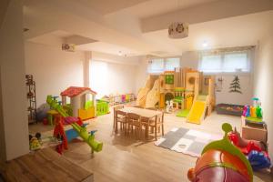 a room filled with lots of different types of play equipment at Askana in Białka Tatrzańska