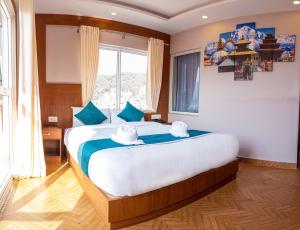 Uma cama ou camas num quarto em Majheri Resort and Spa