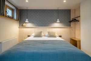 Postel nebo postele na pokoji v ubytování B2 Apartments