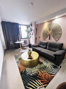 A seating area at Poem Apartments, Las Canteras