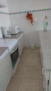 Kuchyňa alebo kuchynka v ubytovaní Appartement T2 44m2 - Chez Maya + 1 fotografia