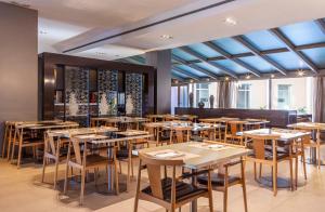 Reštaurácia alebo iné gastronomické zariadenie v ubytovaní Porcel Torneo