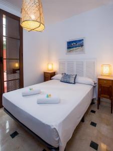 A bed or beds in a room at Mesones 54