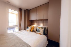 Ένα ή περισσότερα κρεβάτια σε δωμάτιο στο Residence Drage №5