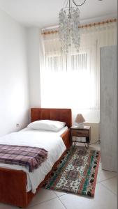 Voodi või voodid majutusasutuse Isabel Rooms toas