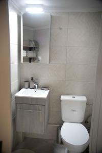A bathroom at Hara's Apartment
