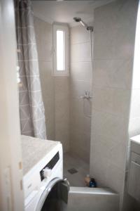 A bathroom at Hara's Apartment