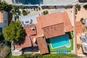 an overhead view of a house with a swimming pool at Entire Large Villa next to Award-winning beach in Campoamor