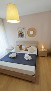 Postel nebo postele na pokoji v ubytování La Terrazza Di Athena sweet rooms