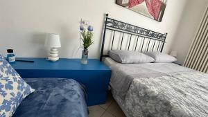 A bed or beds in a room at CA' DEI GELSI BEACH