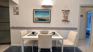 A seating area at CA' DEI GELSI BEACH