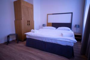 Postel nebo postele na pokoji v ubytování Hotel PAYER II