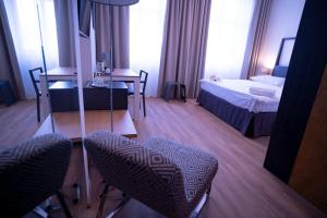 Postel nebo postele na pokoji v ubytování Hotel PAYER II