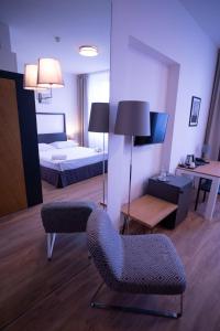 Postel nebo postele na pokoji v ubytování Hotel PAYER II
