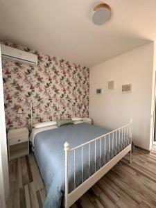 Postel nebo postele na pokoji v ubytování B&B Dimora delle Ninfee + 31 fotografií