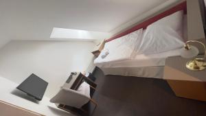 Postel nebo postele na pokoji v ubytování Hotel PAYER