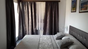 Posteľ alebo postele v izbe v ubytovaní Apartments Aurora Borik