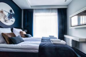 Кровать или кровати в номере NovaWisła Resort & SPA