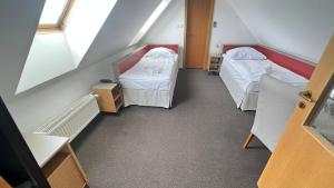 Postel nebo postele na pokoji v ubytování Hotel PAYER