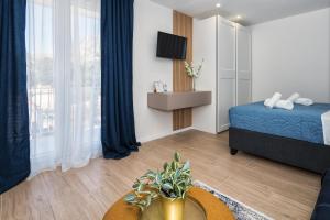 Voodi või voodid majutusasutuse Skalinada Sea View toas