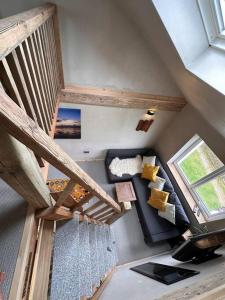 an overhead view of a staircase in a tiny house at Sea View Nook in Porthtowan