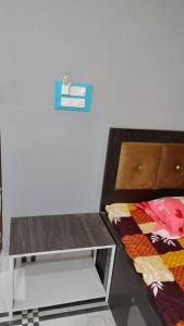 Postel nebo postele na pokoji v ubytování Sagarika Guest House