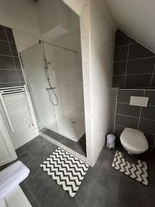 Koupelna v ubytování Maison spa, jacuzzi sauna