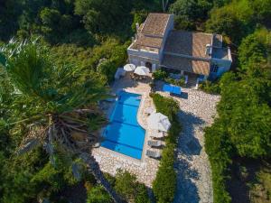 The swimming pool at or close to Avlaki Beach House,stylish villa in Kassiopi