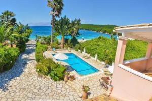The swimming pool at or close to Avlaki Beach House,stylish villa in Kassiopi