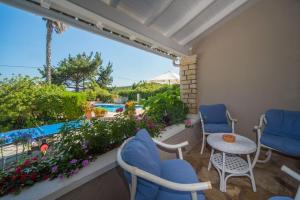 The swimming pool at or close to Avlaki Beach House,stylish villa in Kassiopi
