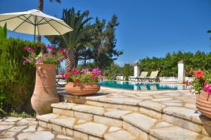 The swimming pool at or close to Avlaki Beach House,stylish villa in Kassiopi