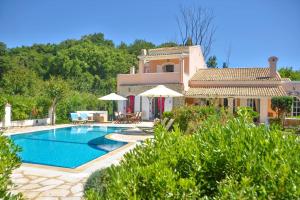 The swimming pool at or close to Avlaki Beach House,stylish villa in Kassiopi