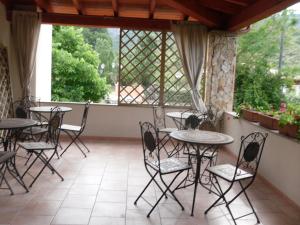 A balcony or terrace at La ginestra Chia B&B