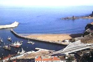 an aerial view of a harbor with boats in the water at Playa monte y mar, casa a 5 minutos del mar in Ondárroa