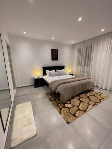 Postel nebo postele na pokoji v ubytování Logement Chic, résidence azaléa - Alger + 90 fotografií